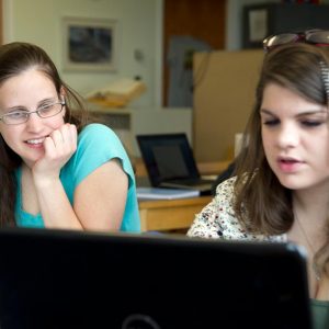 female students at the UMaine Writing Center
